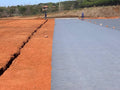 Roll of non-woven geotextile membrane for arena base layers