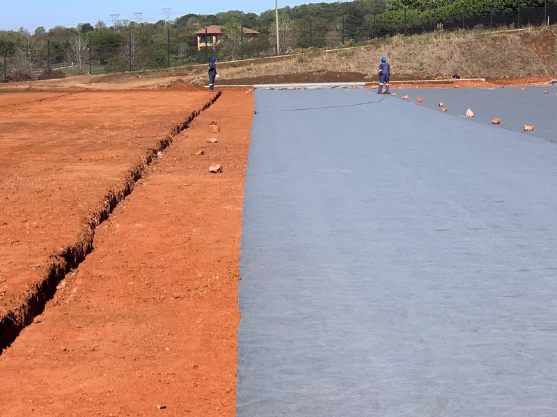 Roll of non-woven geotextile membrane for arena base layers